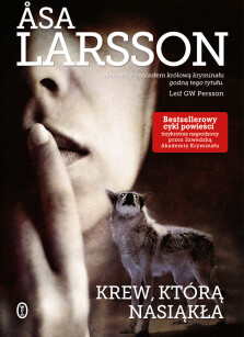 Okładka książki: Krew, którą nasiąkła